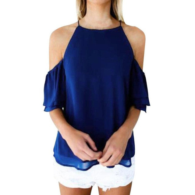 Hermosa blusa de shiffon, mangas holgadas y hombros descubiertos.