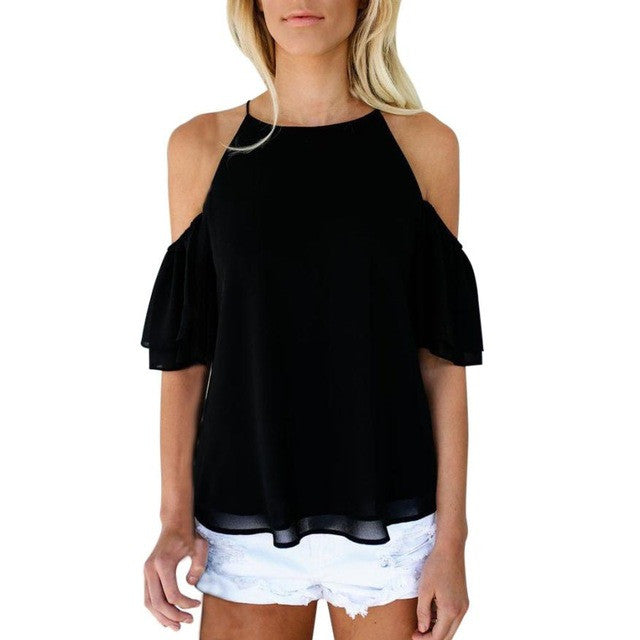 Hermosa blusa de shiffon, mangas holgadas y hombros descubiertos.